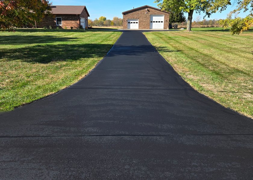 long rural driveway after sealcoating