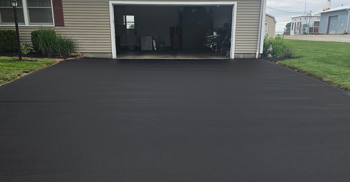 fresh black driveway after sealcoating