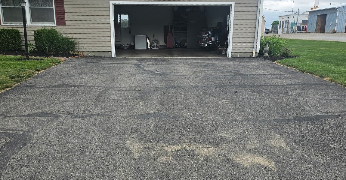 weathered driveway before sealcoating